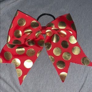 Red and gold polkadot bow